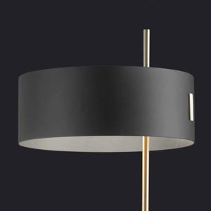 Oluce 1953 Floor Lamp – close-up of black and gold lampshade with warm lighting