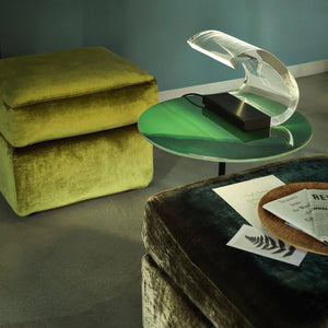 Oluce Acrilica 281/LBT table lamp on green ottoman in luxury room by LoríaDesign
