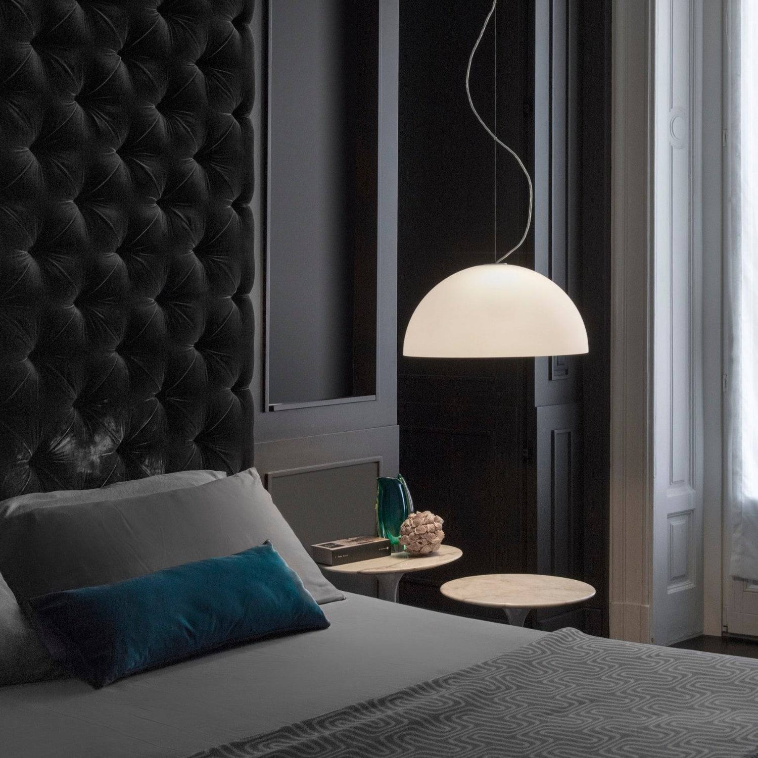 Oluce Sonora Pendant Light – Sleek Italian lighting fixture adding elegance to a luxury bedroom.